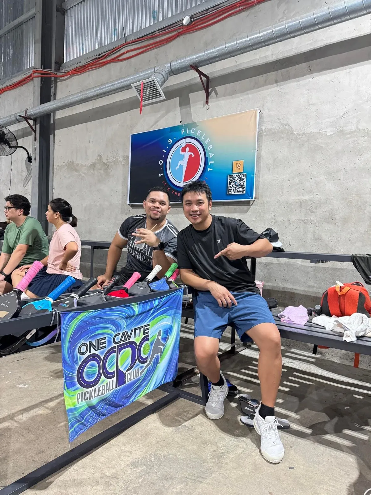 OCPC members with a banner at Pampanga Pickleball Center