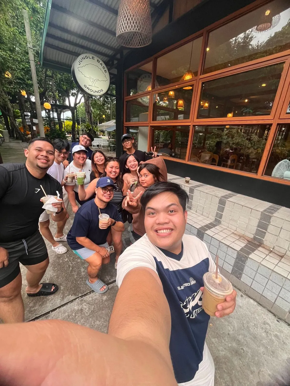 OCPC members with matcha drinks at Jungle Base Grounds