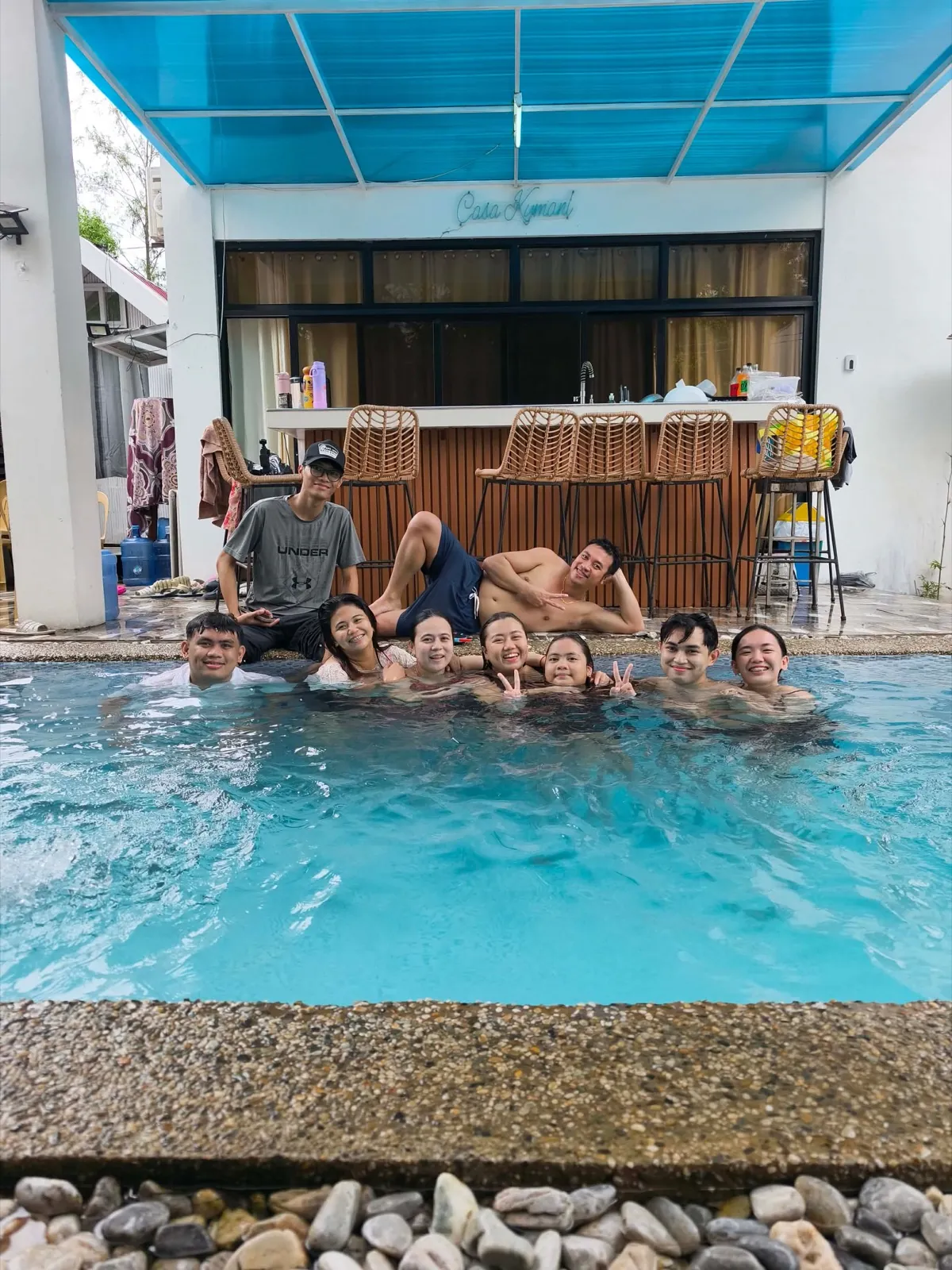 OCPC members swimming and bonding at the Airbnb pool