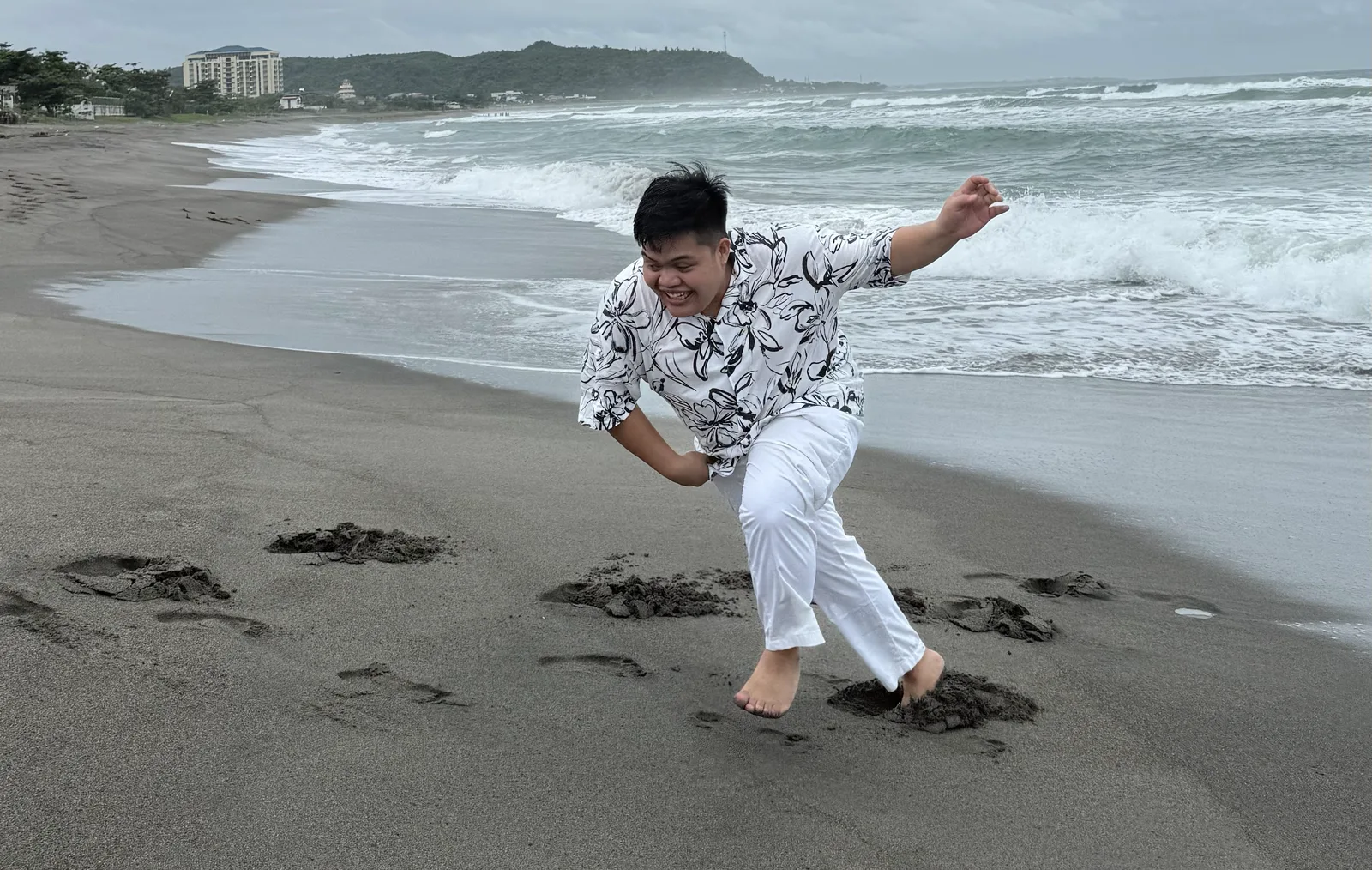 OCPC member running on the beach in La Union
