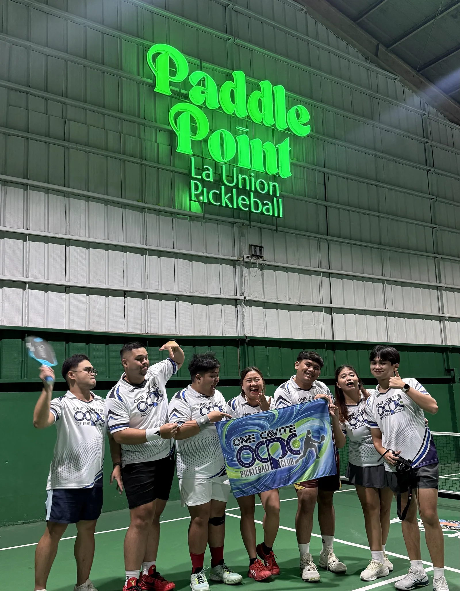 OCPC team photo with the OCPC banner at PaddlePoint La Union